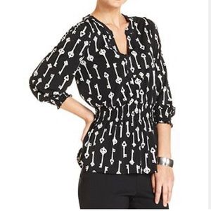 key printed peplum top. 🔑